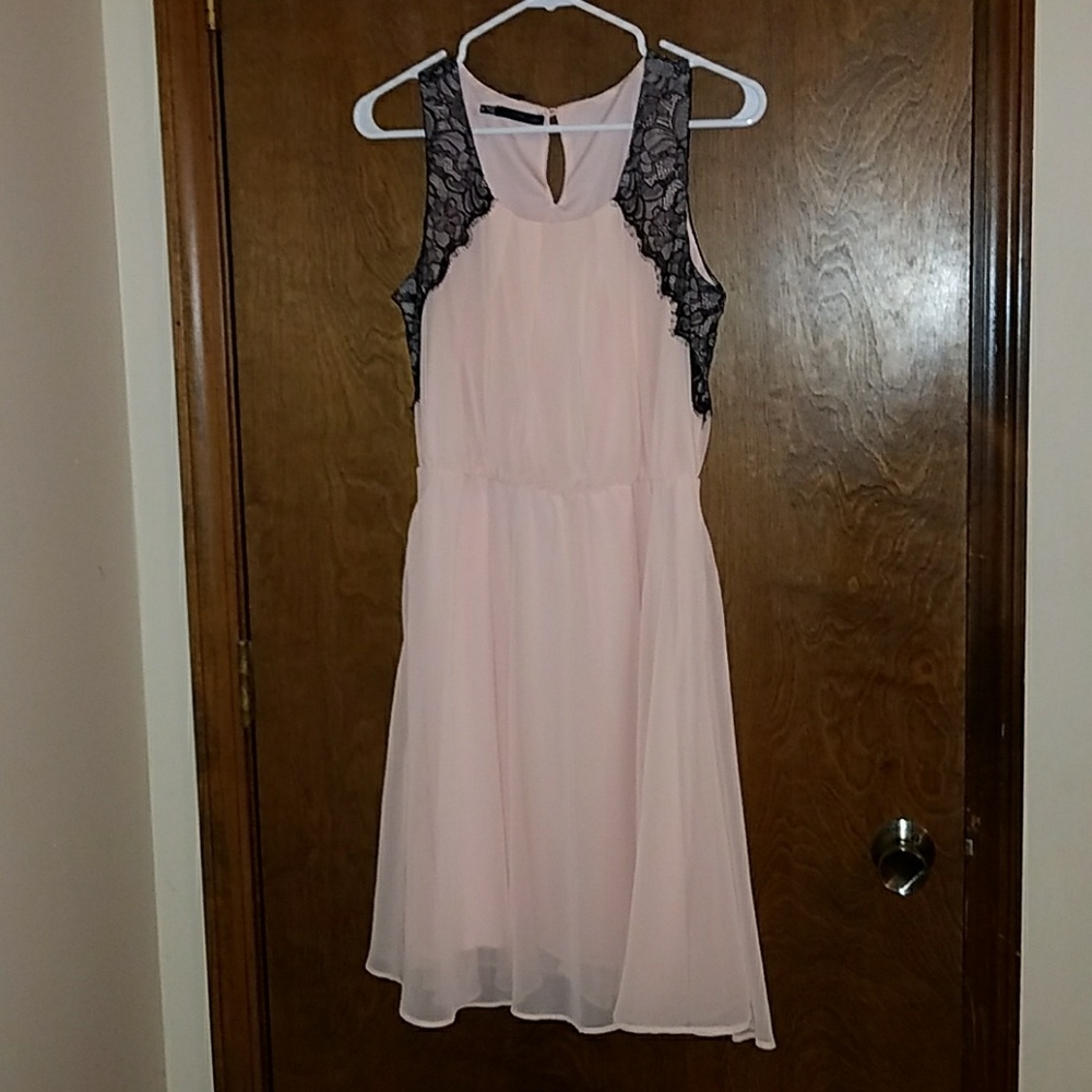 Blush dress with black lace detail